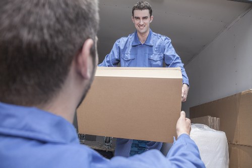 Same day removals van and movers in Docklands near modern apartment buildings
