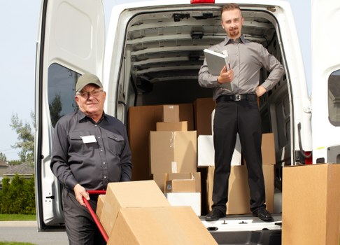 Removal team planning a Docklands move near waterside apartments