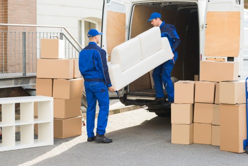 Removal team planning a move in a Docklands apartment building