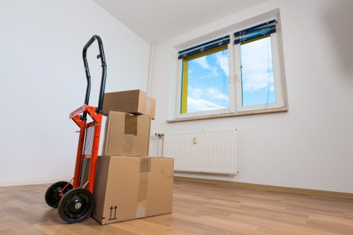 Docklands commercial relocation with boxes and workstations in a modern building