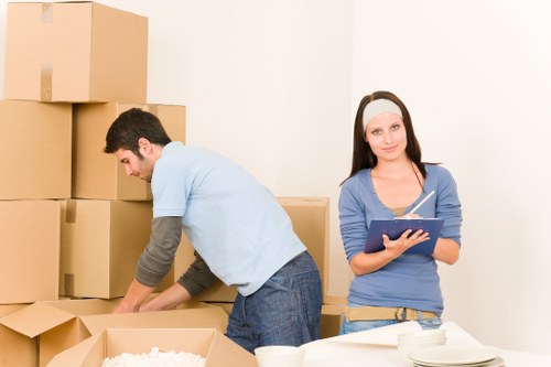 Packed moving boxes and household items ready for transport