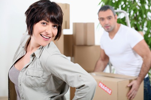 Apartment move support in Docklands with boxes and furniture