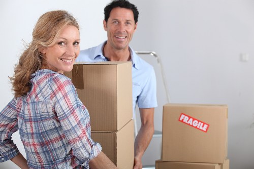 Removal crew loading belongings for a Docklands apartment relocation