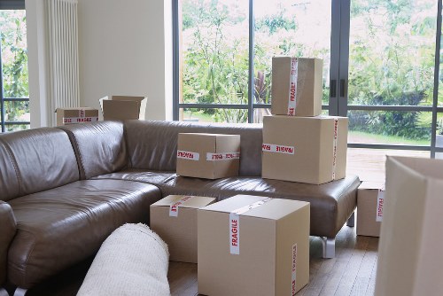 Furniture and boxes being moved by a local man and van team
